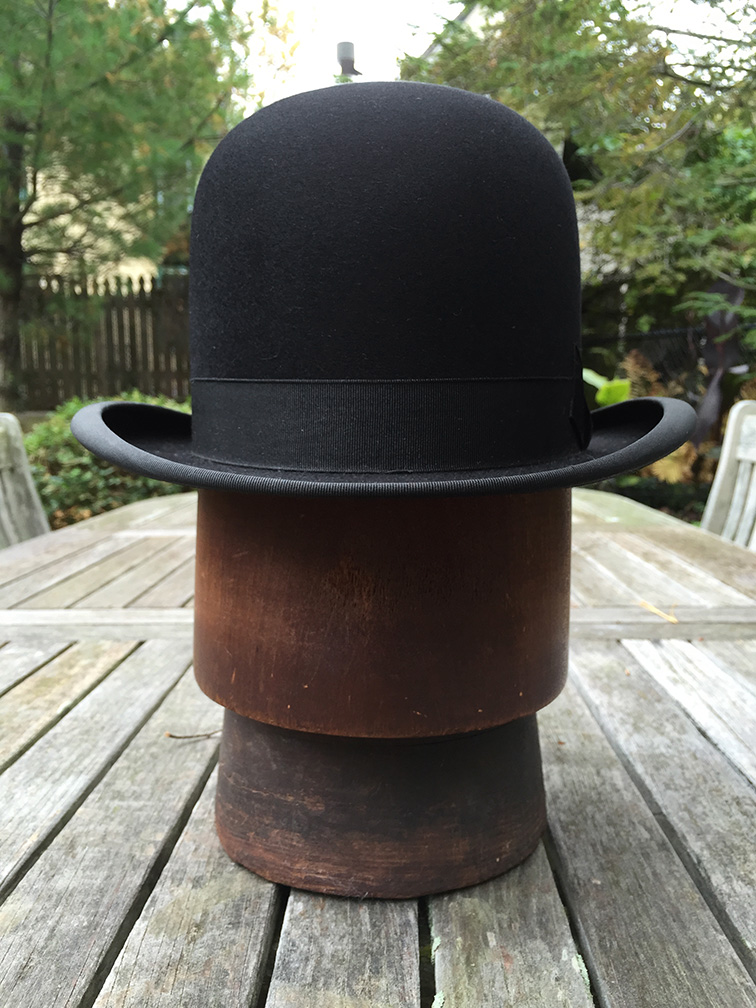 tall bowler hat